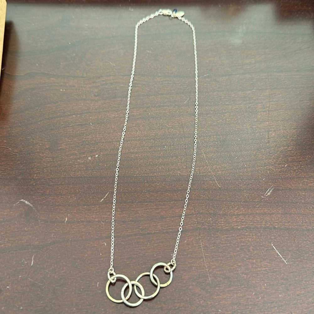 EFYTAL connected ring necklace. Good used condition. Super cute. Including box.